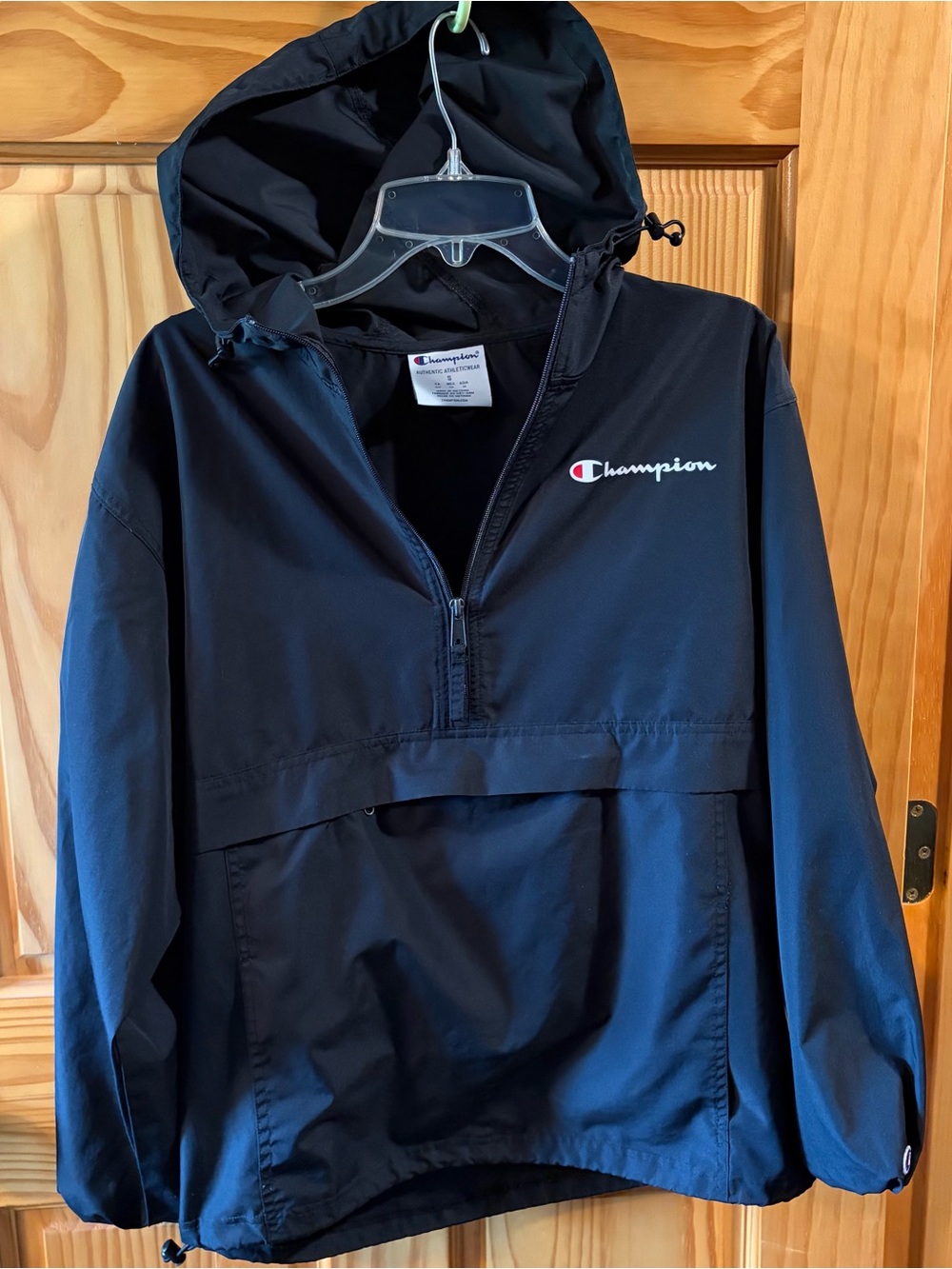 Champion Black Jacket with White Label and Blue Logo